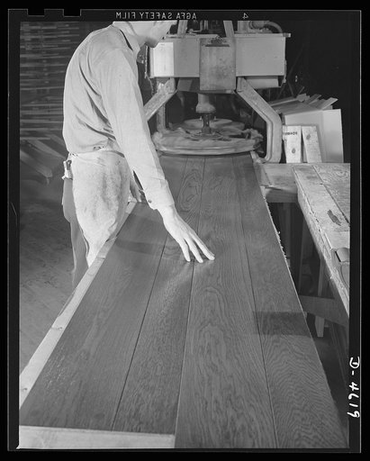 Conversion. Flooring to gunstocks. Flooring the Axis. Following the last lot of hardwood plank flooring to go through a large Midwest plant before conversion to the manufacture of gunstocks or rifle furniture. Louisville, Kentucky
