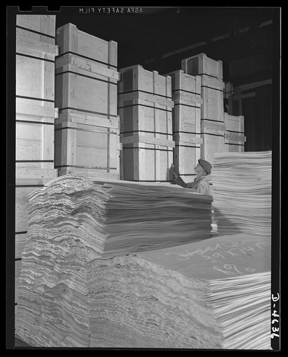 Production. Veneer for aircraft and other war essentials. Poplar veneer is inspected before being made into panels for combat planes. These rotary-cut strips are carefully checked for quality and thickness in a big Midwest veneer plant. Louisville, Kentucky