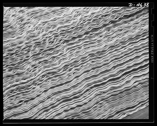 Production. Veneer for aircraft and other war essentials. Designing corrugated wood. Aircraft poplar veneer after drying and just before inspection and cutting in a Midwest factory. Louisville, Kentucky
