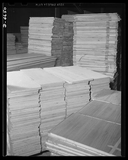 Production. Plywood for aircraft and boats. Plywood panels for combat planes and boats. These panels, produced in a Midwest plant, have remarkable properties. The synthetic resins used as adhesives make a bond that is stronger than the wood itself, and they resist water so well that they may be boil