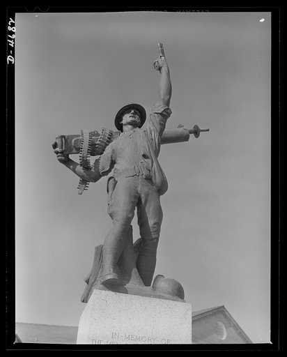 Parris Island Marine Corps. Symbol of all the men who have served in the Marine Corps through its proud history is this bronze statue erected at Parris Island base to the memory of Marines who gave their lives during the last war