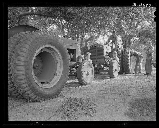 Parris Island. Marine Corps barrage balloons. Marines in training at Parris Island, South Carolina add one more fighting trick to the many they already know. These fast, powerful tractors are used for positioning power winches from which tactical formations of barrage balloons are controlled