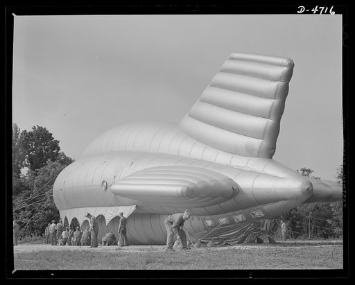 Parris Island. Marine Corps barrage balloons. Bedding down a big barrage balloon is just another job that the leathernecks take in stride as special marine units are trained at Parris Island, South Carolina. "Purging" it with fresh gas before it goes aloft again and running it up into a tactical for