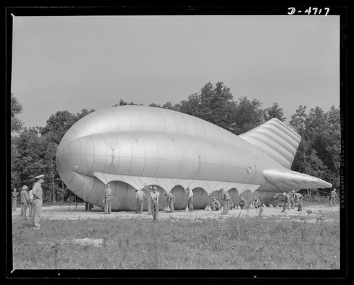 Parris Island. Marine Corps barrage balloons. Bedding down a big barrage balloon is just another job that the leathernecks take in stride as special marine units are trained at Parris Island, South Carolina. "Purging" it with fresh gas before it goes aloft again and running it up into a tactical for