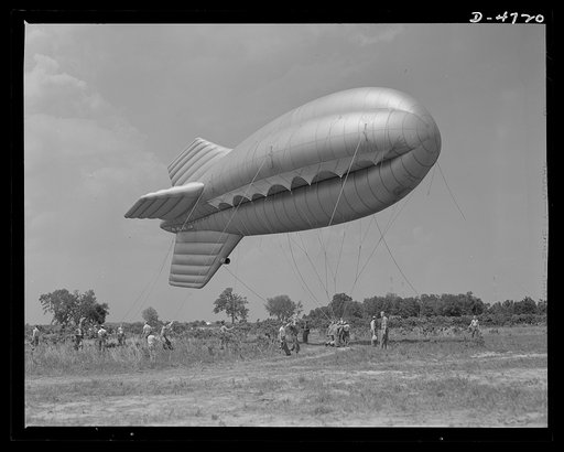 Parris Island. Marine Corps barrage balloons. Up she goes. A barrage balloon takes to the air under the capable handling of a Marine Corps ground crew at Parris Island, South Carolina. Special marine units assigned to the work have made the balloon barrage an effective method of preventing enemy air