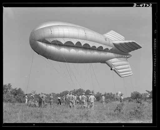 Parris Island. Marine Corps barrage balloons. Up she goes. A barrage balloon takes to the air under the capable handling of a Marine Corps ground crew at Parris Island, South Carolina. Special marine units assigned to the work have made the balloon barrage an effective method of preventing enemy air