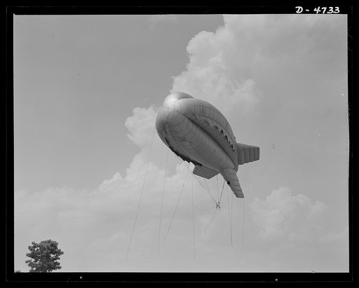 Parris Island. Marine Corps barrage balloons. Putting the Indian sign on Axis dive bombers and strafing planes. This barrage balloon, under control of a Marine unit in training at Parris Island, South Carolina is part of a plane trap that protects important ground installations. Planes cannot come c
