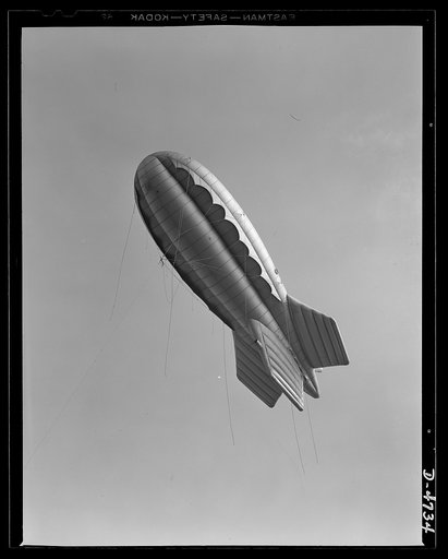 Parris Island. Marine Corps barrage balloons. Putting the Indian sign on Axis dive bombers and strafing planes. This barrage balloon, under control of a Marine unit in training at Parris Island, South Carolina is part of a plane trap that protects important ground installations. Planes cannot come c