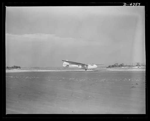 Parris Island. Marine Corps gliders. End of a succesful glider flight by a marine student pilot at Page Field, Parris Island, South Carolina. After 1000 such flights and such other accomplishments as precision landings and strange field landings, the young gyrene earns the coveted title of glider pi
