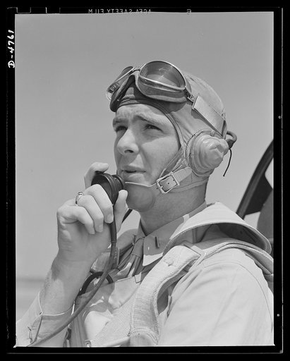 Parris Island. Marine Corps gliders. Glad he's on our side, not theirs. This lieutenant of the Marine Corps, studying glider piloting at Page Field, Parris Island, South Carolina, may some day land in battle dress on the outskirts of Berlin or Tokyo or on the heel of Italy's boot