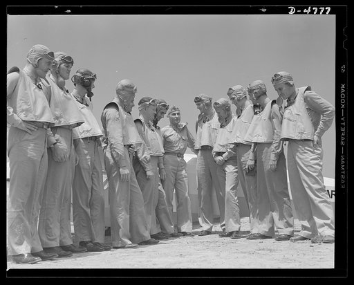 Parris Island. Marine Corps gliders. Look out for these boys, Adolph. Some day, these lieutentants of the Marine Corps may land in battle dress at Berchtesgaden. Now they're learning how to pilot gliders at Page Field, Parris Island, South Carolina