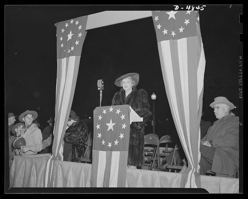 Four Freedoms and Arsenal of Democracy posters. A civilian defense worker in the nation's capitol. District of Columbia commissioner J. Russell Young, Colonel Lemuel Bolles, District of Columbia director of civilian defense addressed the throng on hand to witness the unveiling in the nation's capito