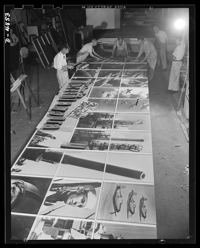 Four Freedoms and Arsenal of Democracy posters. The Arsenal of Democracy panel at the National and Civilian Defense Exposition is readied by workmen. Only half the panel is shown here. This and a montage representing the Four Freedoms were designed by Jean Carlu, eminent psoter artist. Each measures