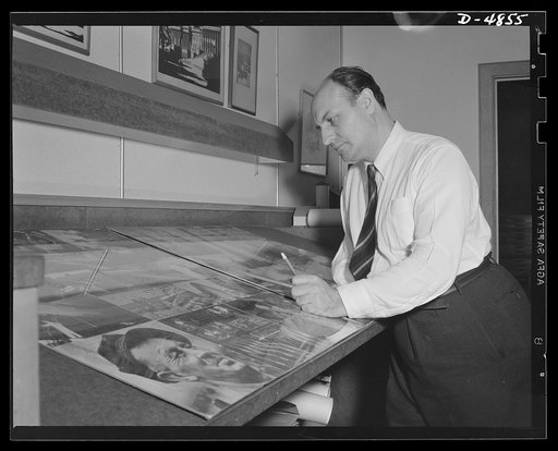 Four Freedoms and Arsenal of Democracy posters. Checking over a dummy of hiArsenal of Democracy panel is the eminent posters artist Jean Carlu. The panel, which measured 15 by 30 feet, is on exhibit now at the National and Civilian Defense Exposition at Grand Central Palace, New York along with anot
