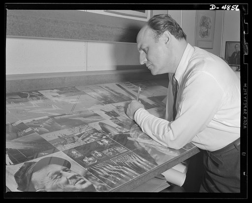 Four Freedoms and Arsenal of Democracy posters. Checking over a dummy of hiArsenal of Democracy panel is the eminent posters artist Jean Carlu. The panel, which measured 15 by 30 feet, is on exhibit now at the National and Civilian Defense Exposition at Grand Central Palace, New York along with anot