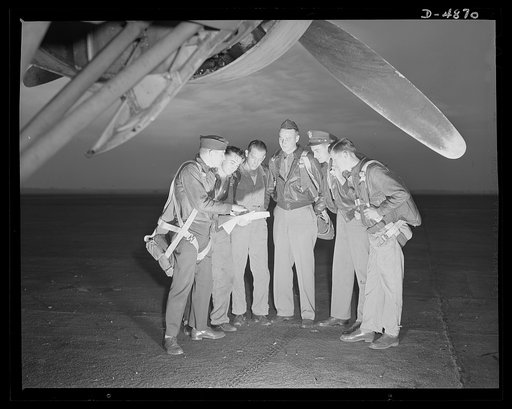 Langley Field, Virginia. YB-17 bombardment squadron. "Here's our mission." A combat crew receives final instructions just before taking off in a mighty YB-17 bomber from a bombardment squadron base at Langley Field, Virginia