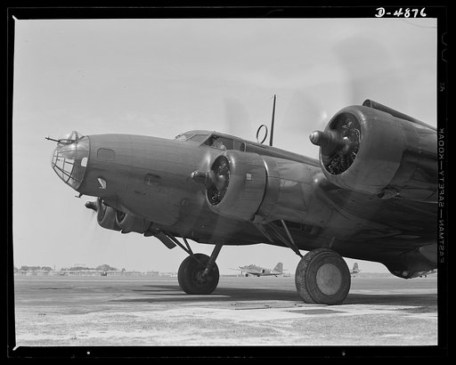 Langley Field, Virginia. YB-17 bombardment squadron. A giant of the airways poises for flight. The four powerful engines of a YB-17 bomber are warmed up before takeoff at Langley Field, Virginia
