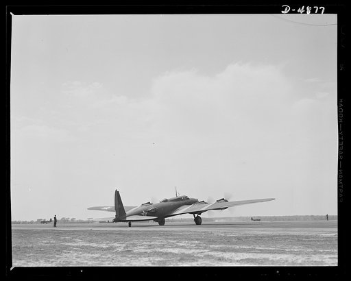 Langley Field, Virginia. YB-17 bombardment squadron. A giant of the airways poises for flight. The four powerful engines of a YB-17 bomber are warmed up before takeoff at Langley Field, Virginia