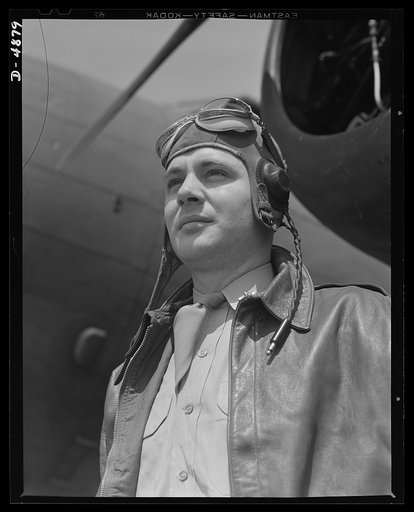 Langley Field, Virginia. YB-17 bombardment squadron. The kind of man Hitler wishes we didn't have. A bomber pilot, captain in a bombardment squadron stationed at Langley Field, Virginia, just before he climbs aboard his huge YB-17 bombing plane