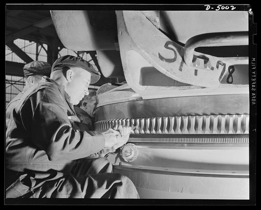 Production. Torpedo tube mounts. Scraping the teeth of a torpedo tube base in a Midwest plant engaged in large-scale production of mounts for torpedo tubes and large naval guns. Westinghouse, Louisville