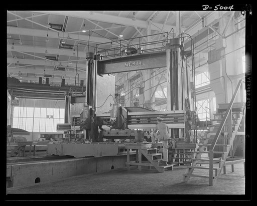 Production. Naval gun mounts. A large casting for a naval gun mount goes through a planing operation in a Midwest plant which is producing gun and torpedo tube mounts in great numbers. Westinghouse, Louisville
