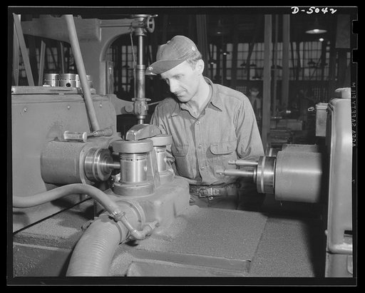 Production. Jeep engines. Cylinders are drilled in jeep engine blocks on the special machinery of a Midwest motor plant. The best of material and workmanship go into the power plants of the tough little army cars. Continental Motors, Michigan