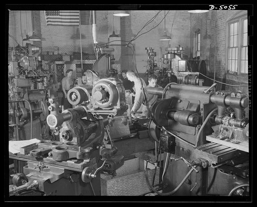 Subcontracting. Bogie-wheel assembly. Facing, counterboring and milling operations are performed on bogie-wheel levers in the machine shop of an Eastern subcontractor. Painesville Machine Company