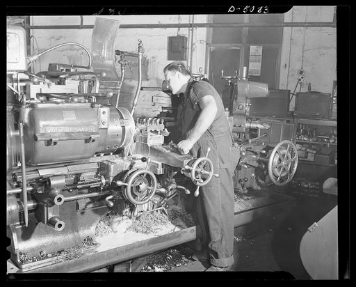 Conversion. Paper money to plant wing parts. Gear blanks for machine tool head stocks are turned in the Eastern plant of a former paper machinery manufacturer. Naval sights and other war essentials are also made in this plant