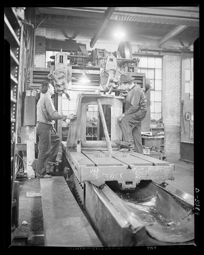 Conversion. Paper machinery to plant wing parts. All bearing surfaces on turret gun mount housings for M-3 tanks are rough planed and finished planed on a fifty inch by fifty inch four-head planer. The job is being done in the plant of an Eastern paper machinery manufacturer who is also turning out 