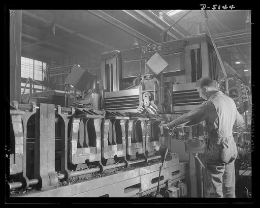 Production. M-4 tanks. Parts for our new M-4 tanks flow in a strong, steady stream from the production lines of a big Eastern plant. Much valuable time is gained by the machining of these bogie-wheel brackets in gangs instead of singly