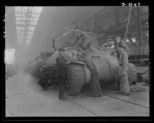 Production. M-4 tanks. From our arsenal of democracy pours a strong, steady stream of mighty M-4 tanks. Each tank is given a final careful check before it rolls off the assembly line of an Eastern plant