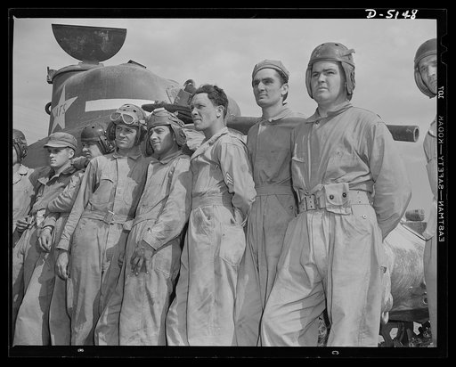 "Tankers," the tough, durable lads who man our traveling forts. These men, members of the crews of M-4 tanks, are about ready to graduate from the Fort Knox, Kentucky school for soldiers of the armored forces