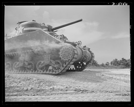 Fort Knox. M-4 tanks and crews. One of our new battleships of the land, a mighty M-4 tank that will disturb a lot of Axis plans. In the welded hulls of these massive machines are armament that ensures tremendous firepower in the hands of tough, resourceful "tankers." Location: Fort Knox, Kentucky