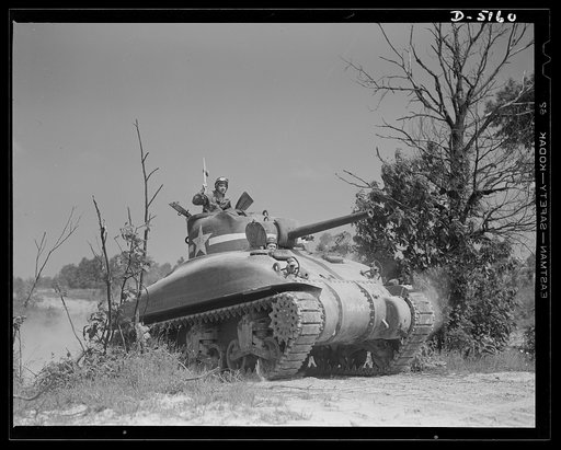 Fort Knox. M-4 tanks and crews. In the massive cast-steel hull of this M-4 tank, a crew of hard-bitten "tankers" is rehearsing a few fighting tricks at a training school of the armored forces at Fort Knox, Kentucky
