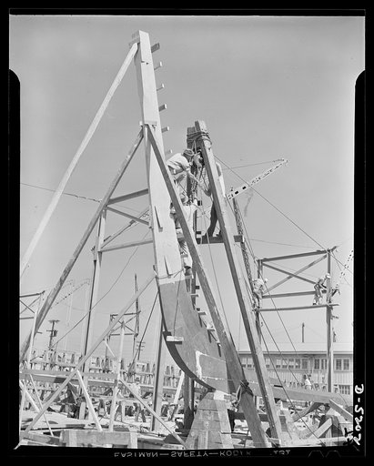 Production. Minesweepers. The stem of a new minesweeper is fitted to its keel in an Eastern shipyard. Painstaking, skilled craftsmen fit every joint to exact dimensions. Gibbs Cass Company