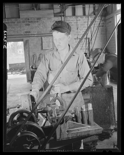 De Land pool. Carr's Machine Shop. C.L. Purcell and his wife had a pretty hard struggle making ends meet these past few years until he went through the defense trade school at Ocala, Florida. Now he is a qualified machinist and welder and can handle most any job in the Carr plant, a key-subcontracto