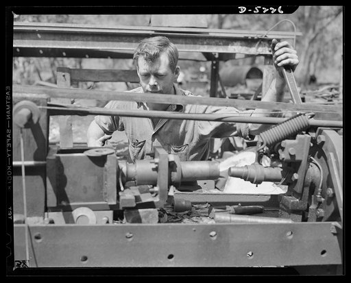 De Land pool. Bits and parts. Casey's machine shop, a unit of the De Land, Florida industrial pool, couldn't make a certain washer fast enough for the contract. So F.W. Casey took parts from a junk heap and built the speed press pictured above. Now it sits in the yard, because of insufficient room i
