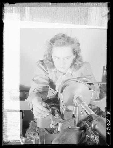 Subcontracting. Passaic home workshop pool. Julianne Milanowska turns cartridge trimming spindles in the Passaic, New Jersey shop of the Howe Machinery Company. This concern is training a number of young women for war production jobs