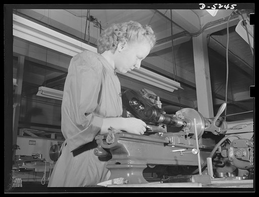 Subcontracting. Passaic home workshop pool. Betty Bruning, who used to be an operator in a curtain factory, grinds a taper on a cartridge drawing punch in the Passaic, New Jersey shop of the Howe Machinery Company. This concern is training a number of young women for war production jobs