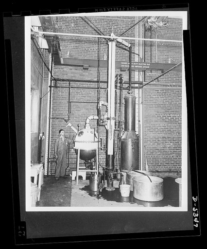 Production of butylene glycol. Butylene glycol is recovered from corn fermentation liquors in an experimental still in the pilot plant of the Northern Regional Research Laboratory of the U.S. Department of Agriculture at Peoria, Illinois. This is one step in the Department's research that led to the