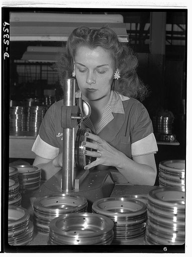 Manpower. Former actress now aircraft worker. From central casting to aircraft casting! Erstwhile child star of the silent picture days, auburn-haired Dorothy Langdon now inspects airplane engine parts in a Detroit war plant. Known as "Baby Dorothy Phelps" of the silents, and heart interest of weste
