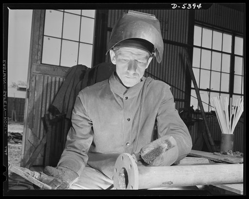 Production. Subchasers. A farmer becomes a shipyard welder, and a good one, in a short time. The Southern yard at which he works on the building of subchasers taught him the trade. He later helped the yard to earn its Navy "E"