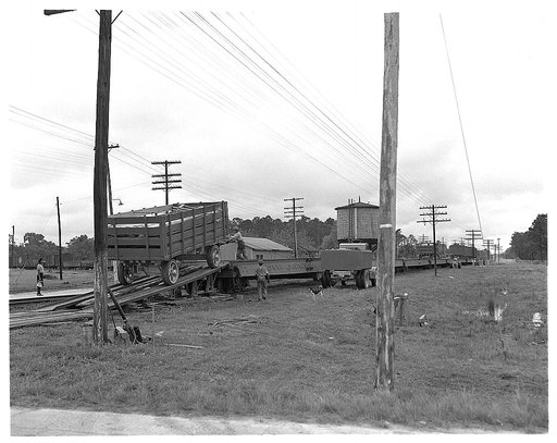 De Land pool. Moving circus. Making way for war in Florida. The De Land industrial pool needed the county fair buildings housing a circus for its defense plant. So the roustabouts loaded the elephants, the sideshows, the big top, and trainloads of other equipment and went on the road a week early th