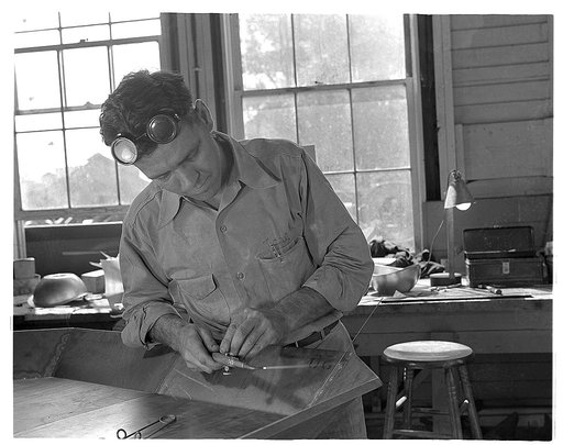 De Land pool. Babcock airplane plant. Earl Gentry was a beverage salesman faced with the loss of his job by the impact of war. He completed 250 hours of training in the De Land, Florida vocational school. Now he's a first-class welder in the Babcock plant in De Land