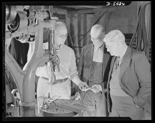 De Land pool. Babcock airplane plant. Together these three men have a total of 160 years of experience as skilled machinists. They are contributing this experience to the De Land, Florida production pool. Left to right: A.B. Kenyon, seventy, retired tool maker; William E. Mansfield, seventy-one, who