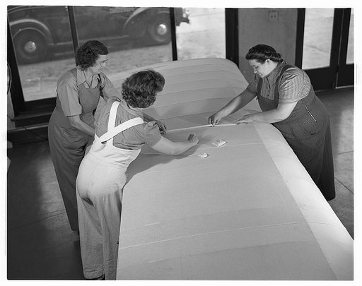 De Land pool. Sewing plane wing fabric. The ladies sewing circle has a grim meaning in De Land, Florida these days. Here's one of its daily sessions, sewing fabric on airplane wings they hope will be flying over Germany some day soon. Nearest the camera is Joyce Newsom, instructor in De Land's vocat