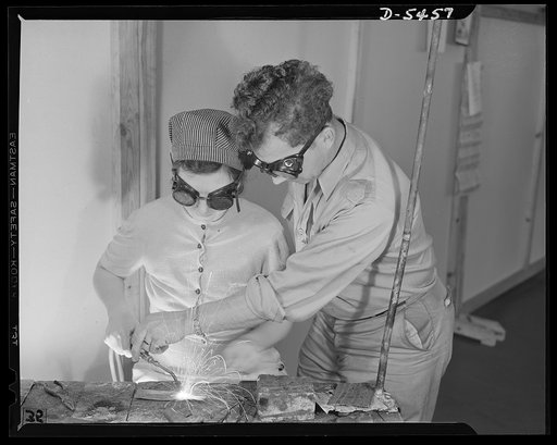 De Land pool. Aircraft construction class. People from every walk of life are taking part in the De Land, Florida Vocational School as they learn war trades. Above is Mrs. Mary Owens, a housewife with three children who now is training others to be aircraft welders. With him is chief instructor Glen
