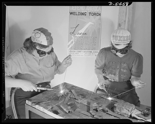 De Land pool. Aircraft construction class. Women of De Land, Florida went to school with their men-folk to learn welding and aircraft fabric work in preparation for the De Land million-dollar war contract. Above Mrs. Ruby Shie, left, former nurse with a husband and one child, and Mrs. William Tomlin