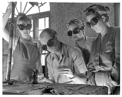 De Land pool. Aircraft construction class. Clyde Williams, instructor in the Volusia County, Florida Vocational School, believes women make just as good welders as men. He is shown here with a new class starting in aircraft welding, part of the training program of the De Land pool to provide workers