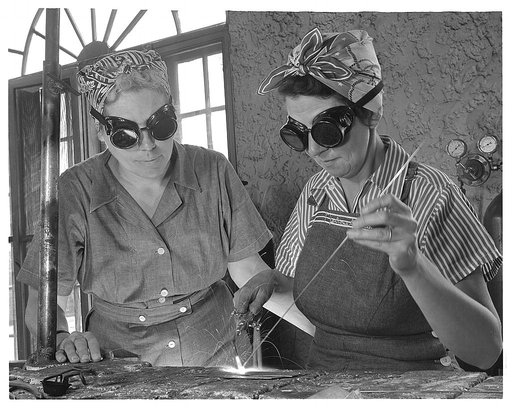 De Land pool. Aircraft construction class. These two Daytona Beach, Florida housewives talk war work and welding like their grandmothers talked about the weekly quilting society, as they learn to take their places on a war production line in the Volusia County Vocational School. Mrs. Nancy H. Herber